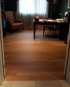 Hardwood flooring adding warmth to a home office space