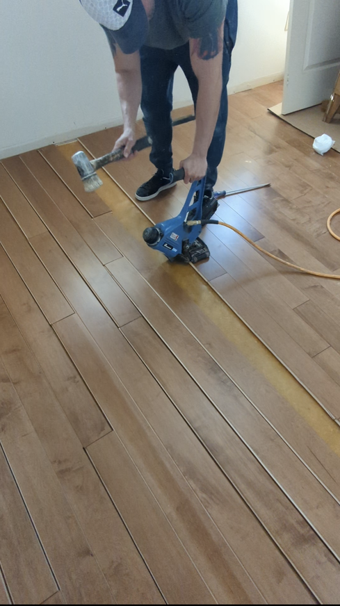 Professional installation of engineered hardwood flooring
