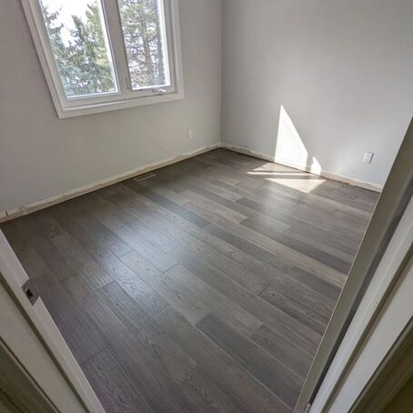 A room with hickory hardwood flooring.