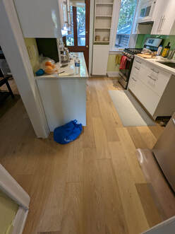 Engineered Hardwood Flooring installed in a kitchen