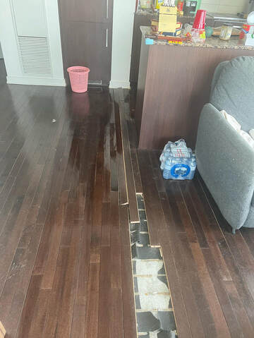 Engineered Hardwood Flooring Water Damage in Kitchen