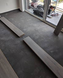 Professional installation of laminate flooring in a Toronto home